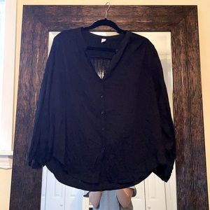 Black button down with rushing on the back top
